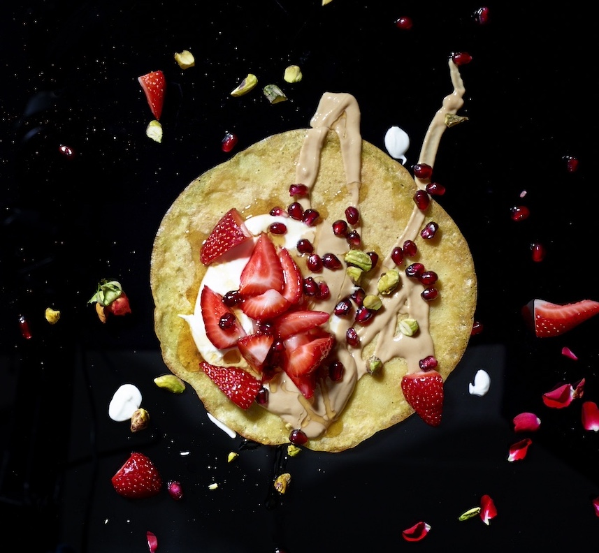 Gluten free chickpea crepe with strawberries and tahini